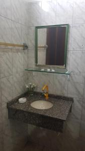 Um banheiro em Pousada Siroba BEIRA RIO