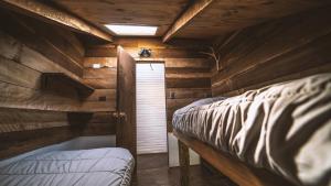 Postel nebo postele na pokoji v ubytování Hostal Climb House