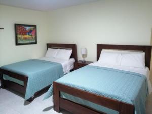 Postel nebo postele na pokoji v ubytování Hotel Anedi + 37 fotografií