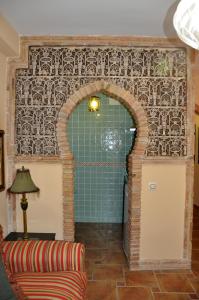 Posedenie v ubytovaní Apartamentos Boutique Doña Maria La Brava