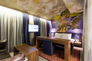 TV a/nebo společenská místnost v ubytování Hotel Hemera