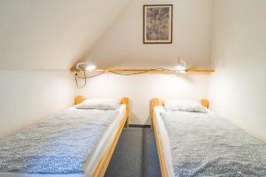 Postel nebo postele na pokoji v ubytování Penzion Lyžec
