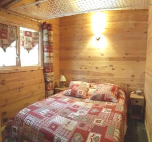 Postel nebo postele na pokoji v ubytování Chalet L' ADRET