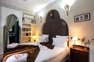 Postel nebo postele na pokoji v ubytování Riad Belle Epoque