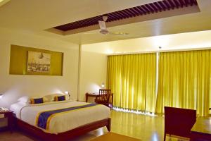 Eighth Bastion Fort Kochi - A CGH Earth Experience房間的床