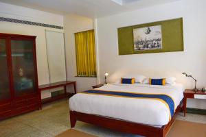 Eighth Bastion Fort Kochi - A CGH Earth Experience房間的床