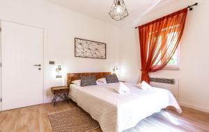 Tempat tidur dalam kamar di Villa Dionis