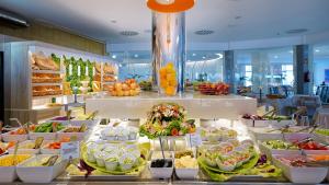 a buffet with many different types of food on display at Bull Escorial & SPA in Playa del Ingles