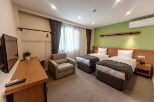 Postel nebo postele na pokoji v ubytování Bram Hotel Istanbul + 37 fotografií