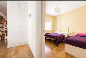 En eller flere senge i et værelse på Romantic Central Terrace