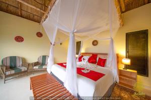 Ένα ή περισσότερα κρεβάτια σε δωμάτιο στο Ihamba Lakeside Safari Lodge