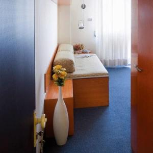 Postel nebo postele na pokoji v ubytování Residence Viserba