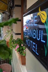 a sign for a banana hotel in a store at Blue Istanbul Hotel in Istanbul