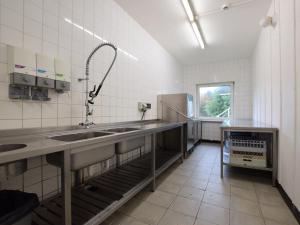 Kuchyň nebo kuchyňský kout v ubytování Villa in Ardennes with Garden & Recreation Room