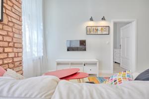 Posteľ alebo postele v izbe v ubytovaní 3D WYGODA Apartamenty