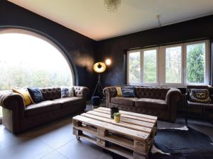 Posezení v ubytování Villa in Ardennes with Garden & Recreation Room
