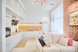 Kuchyňa alebo kuchynka v ubytovaní 3D WYGODA Apartamenty