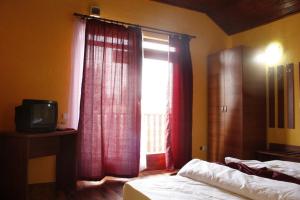 TV/trung tâm giải trí tại Cabana Veche Trei Brazi