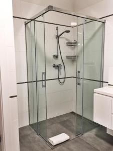 Kúpeľňa v ubytovaní Apartamenty Zajezdnia MTP