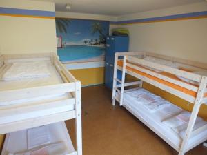 Postel nebo postele na pokoji v ubytování Max Hostel