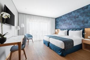 Eurostars Matosinhos客房内的一张或多张床位