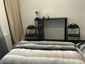 Ein Bett oder Betten in einem Zimmer der Unterkunft Wagner Ferien Apartments
