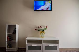 A television and/or entertainment centre at Your apartment in Athens (Next to Metro & Acropolis)
