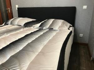 Ein Bett oder Betten in einem Zimmer der Unterkunft Wagner Ferien Apartments