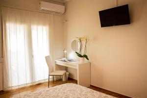 A television and/or entertainment centre at Your apartment in Athens (Next to Metro & Acropolis)