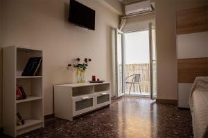 A television and/or entertainment centre at Your apartment in Athens (Next to Metro & Acropolis)