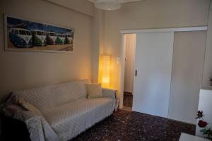 A seating area at Your apartment in Athens (Next to Metro & Acropolis)