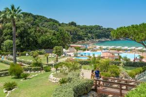 a view of the resort and the pool at Hotel Del Golfo in Procchio