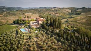 an aerial view of a house with a lot of trees at Borgo Divino in Montespertoli