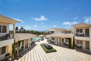 a view of the courtyard of a villa at The Acacia Morjim in Morjim