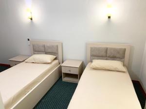 Voodi või voodid majutusasutuse Kriva Resort toas