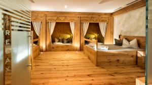 Ένα ή περισσότερα κρεβάτια σε δωμάτιο στο Hotel Sun