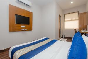 Postel nebo postele na pokoji v ubytování Hotel Airside