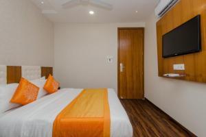 Postel nebo postele na pokoji v ubytování Hotel Airside