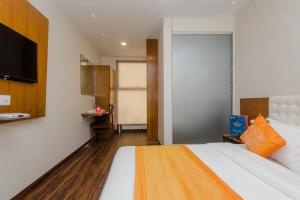 Postel nebo postele na pokoji v ubytování Hotel Airside