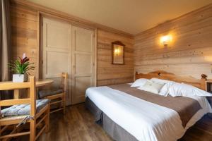 Postel nebo postele na pokoji v ubytování Hôtel La Montagne