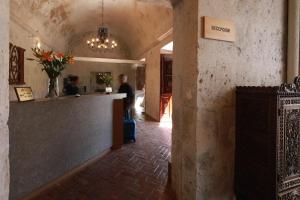 Lobbyn eller receptionsområdet på San Agustin Posada del Monasterio