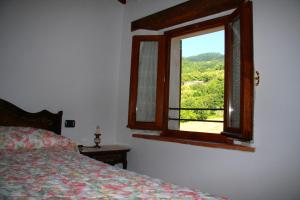 Postel nebo postele na pokoji v ubytování Borgo Fango