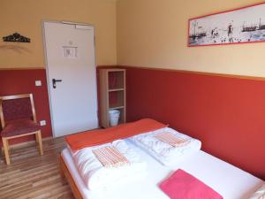 Postel nebo postele na pokoji v ubytování Max Hostel