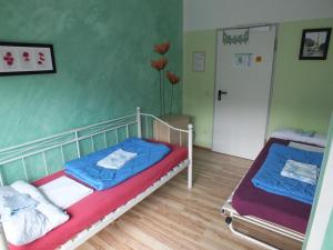 Postel nebo postele na pokoji v ubytování Max Hostel
