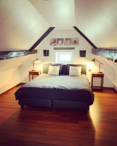 Llit o llits en una habitació de Gite de La Belle Etable