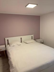 Postel nebo postele na pokoji v ubytování Aix Hotel