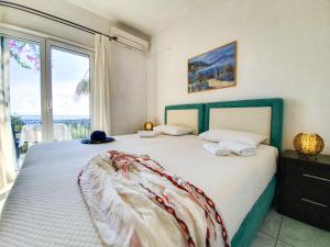 Posteľ alebo postele v izbe v ubytovaní Giovanni Group Apartments