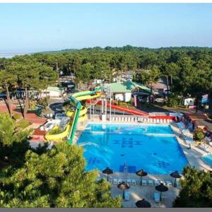 an overhead view of a large water park at Camping la Palmyre in Les Mathes