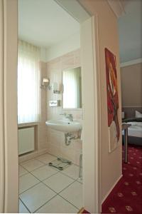 Ванна кімната в Isselhorster Landhaus