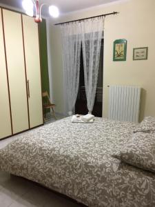 Posteľ alebo postele v izbe v ubytovaní Dimora Pizzone